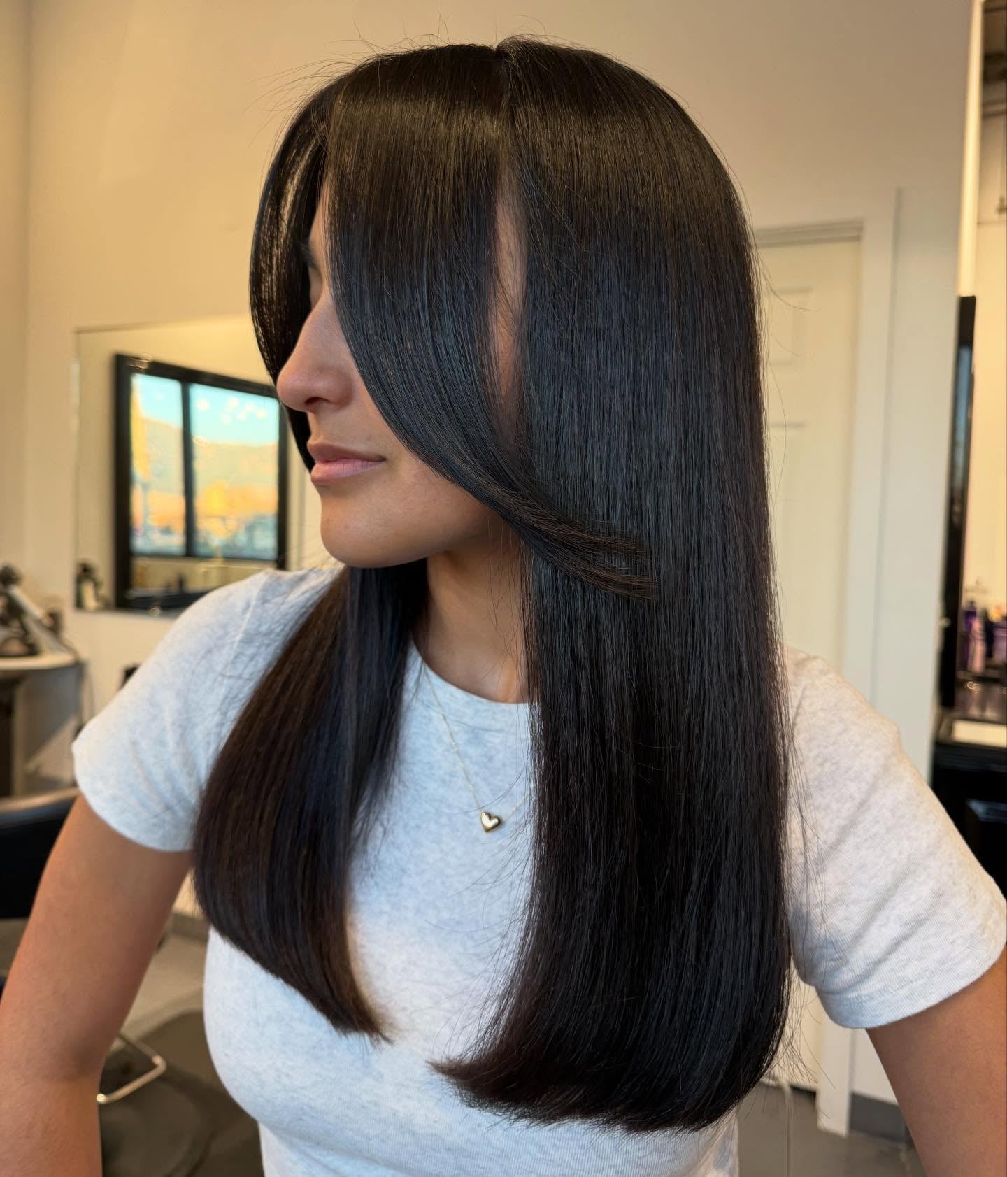 Curtain bangs and gloss by Alayna Aanerud