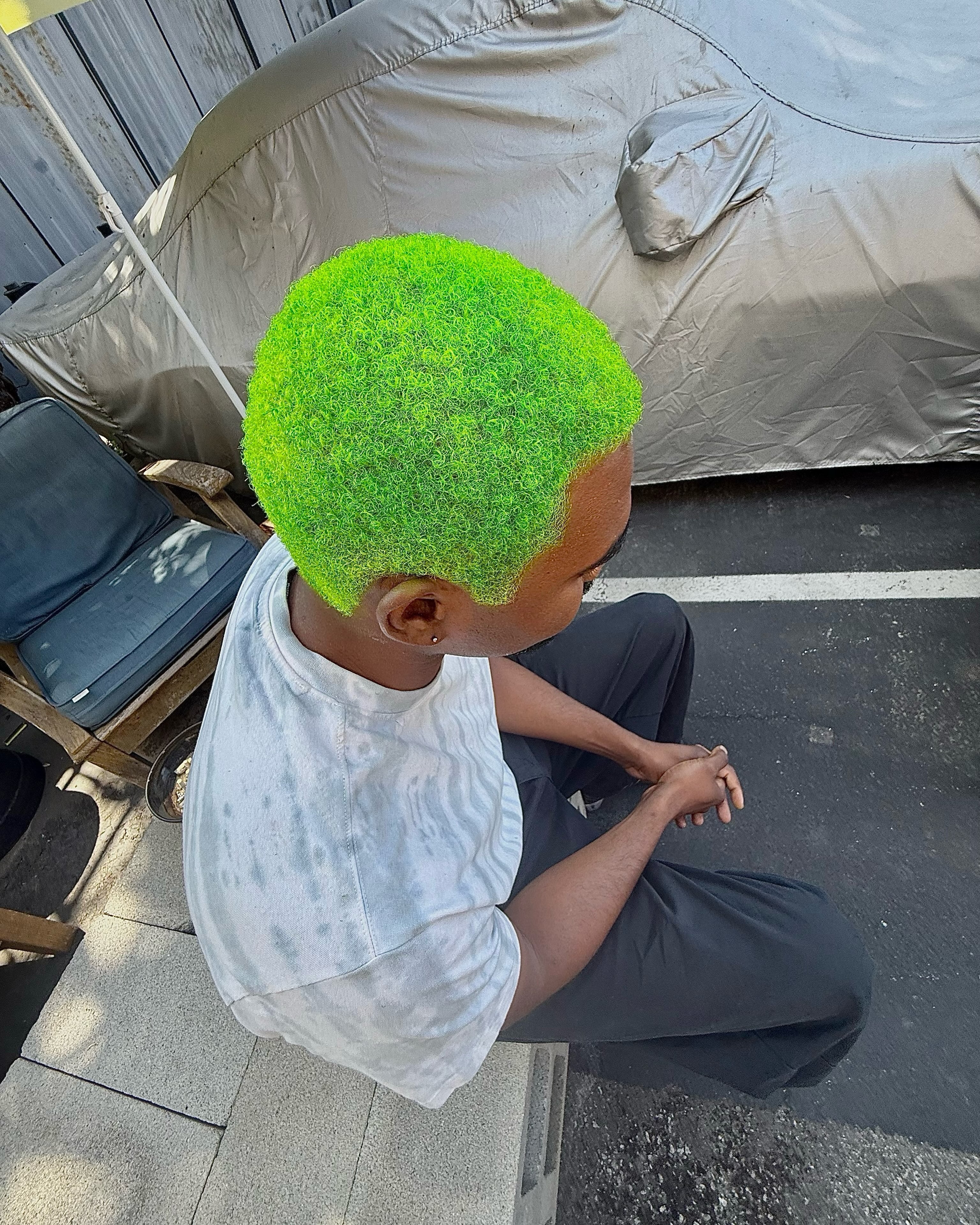 Neon green buzz cut by Alayna Aanerud