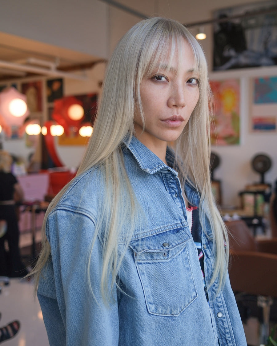Platinum blonde hair with soft fringe by Daniel Moon