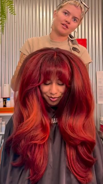 Red layers hair by Alayna Aanerud at Hair Los Angeles