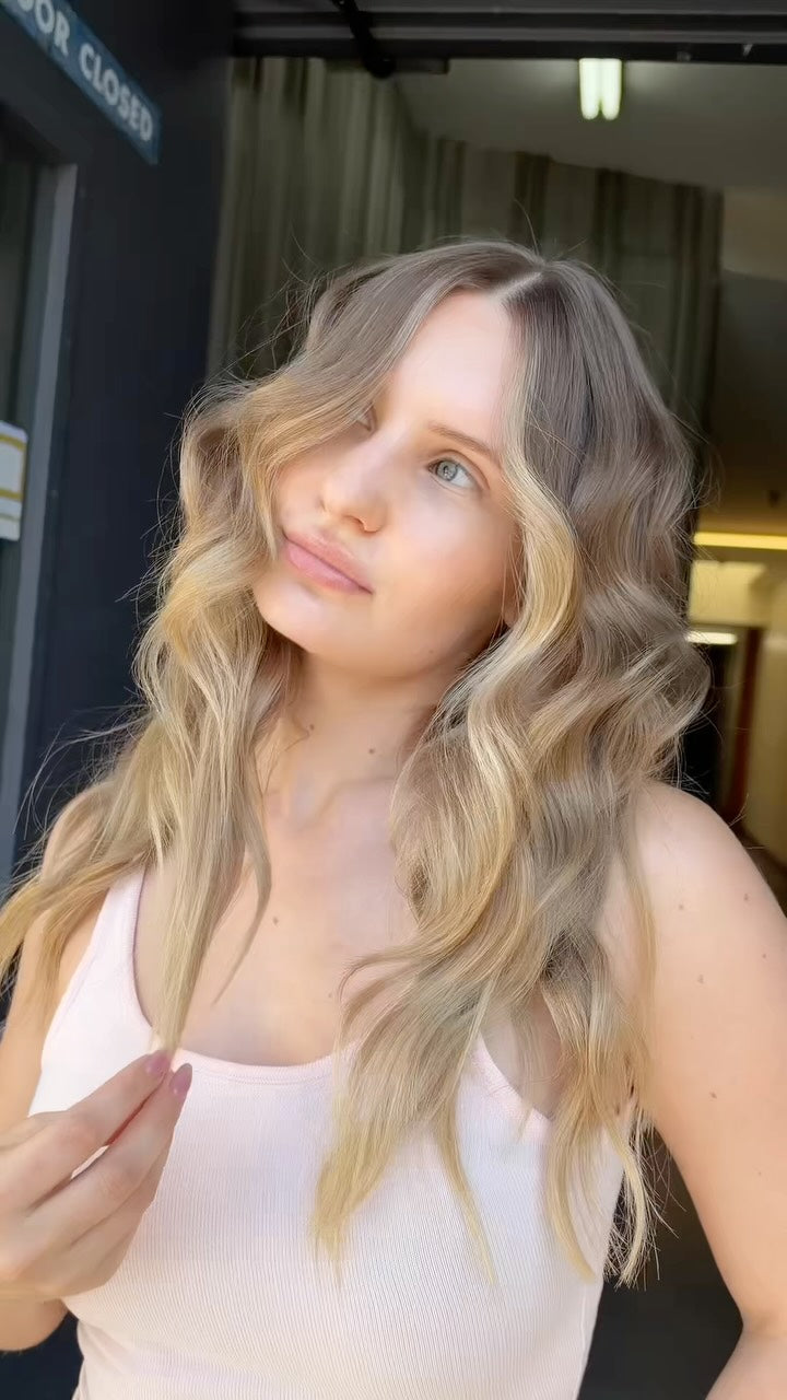 Soft dimensional blonde waves with face-framing layers by Alayna Aanerud at Hair Los Angeles
